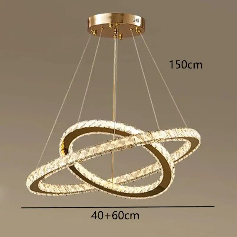 Gold-toned decorbites crystal chandelier pendant light with three interlocking crystal rings for stair lighting