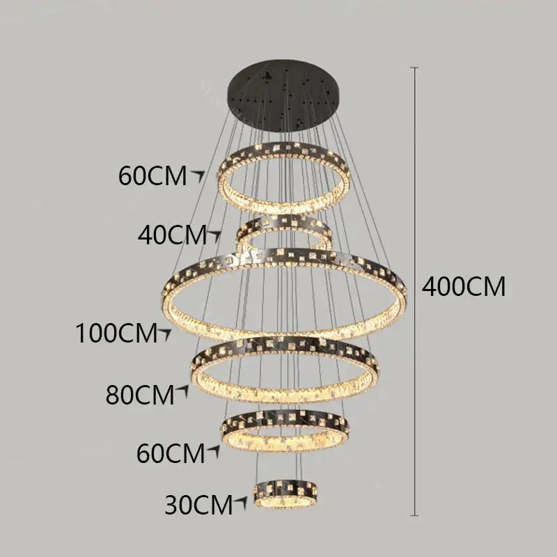 Modern DecorBites crystal chandelier stair pendant with tiered concentric rings, sparkling crystals, and warm LED lighting