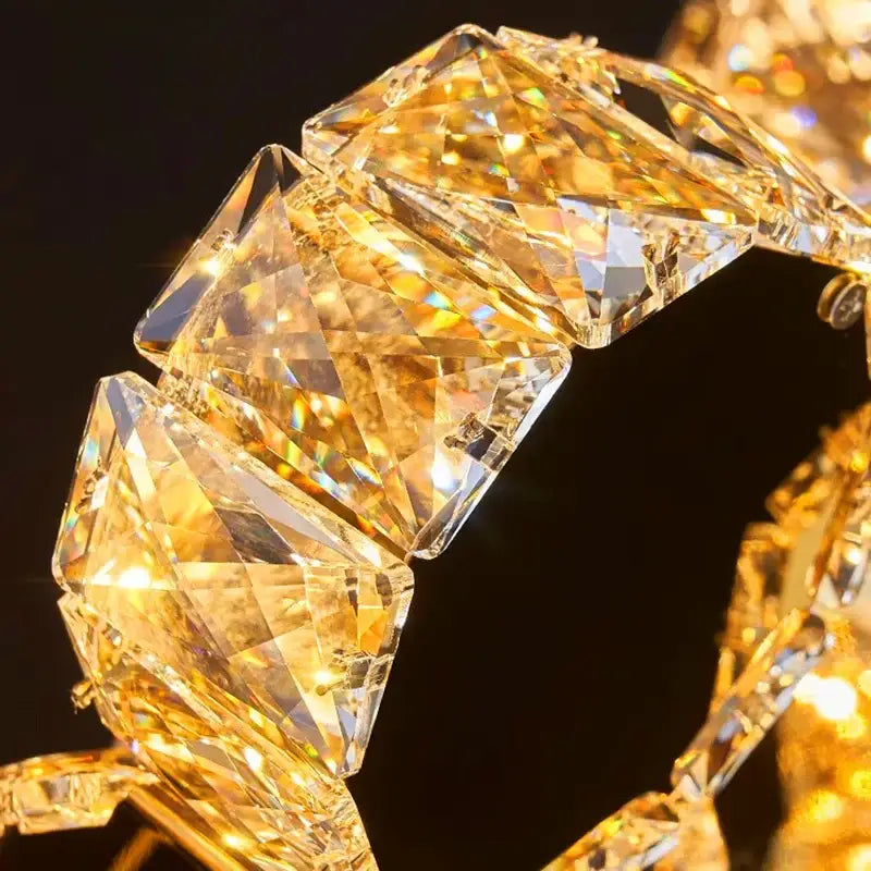 Decorbites crystal chandelier stair pendant lamp with a dazzling gold-toned crystal bracelet featuring faceted geometric links