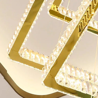 Gold-toned DecorBites crystal chandelier pendant lamp with faceted crystal accents for stair and living room lighting