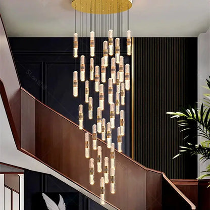 Modern DecorBites crystal chandelier pendant lamp with golden circular top and crystal-embedded glass cylinders for stair lighting