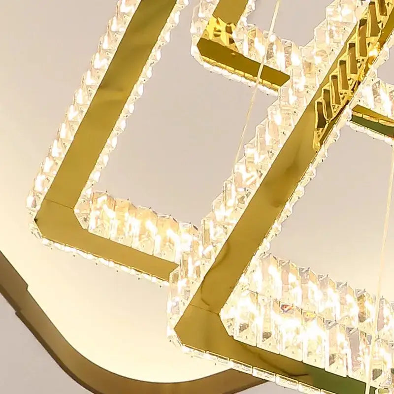 Gold-toned DecorBites crystal chandelier pendant light with faceted crystal accents for modern interior lighting