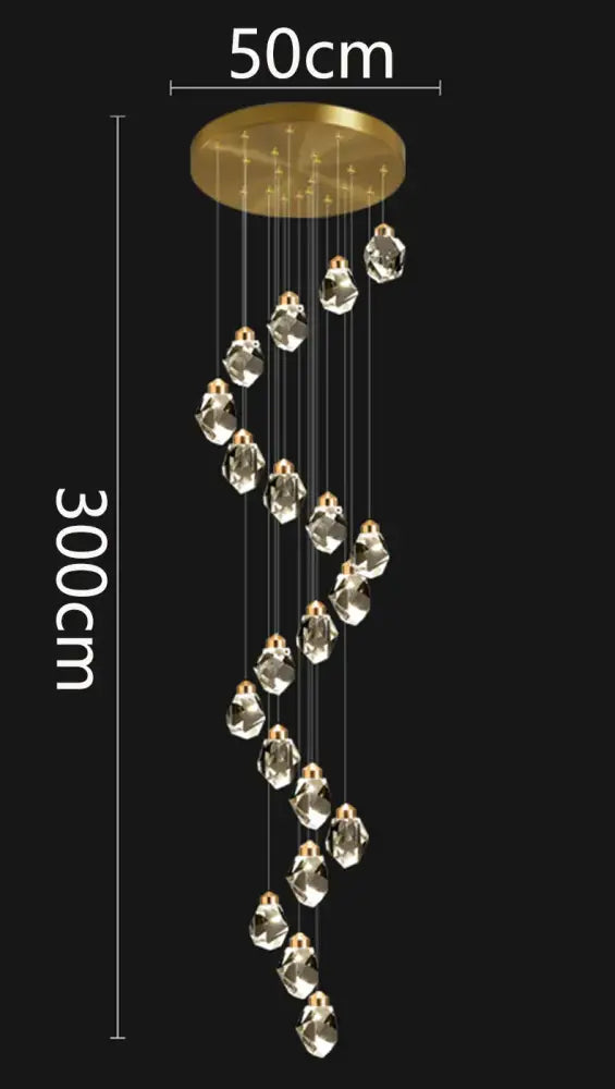 A 300cm tall gold-toned decorbites crystal chandelier pendant light with clear crystal droplets for modern interiors