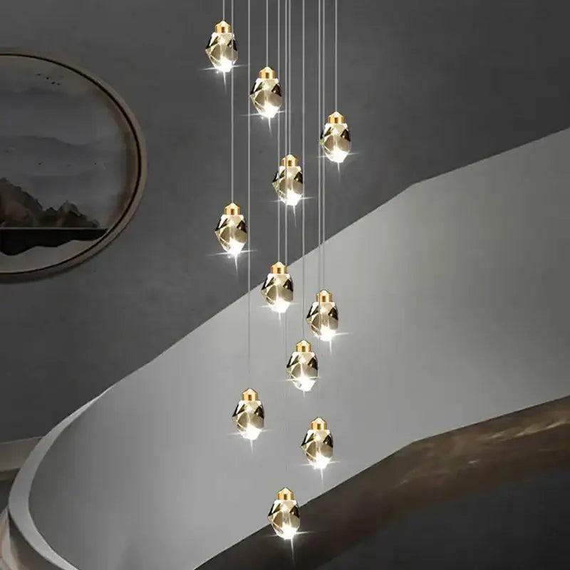 Modern gold-toned decorbites crystal chandelier pendant light with faceted geometric crystals for living room lighting