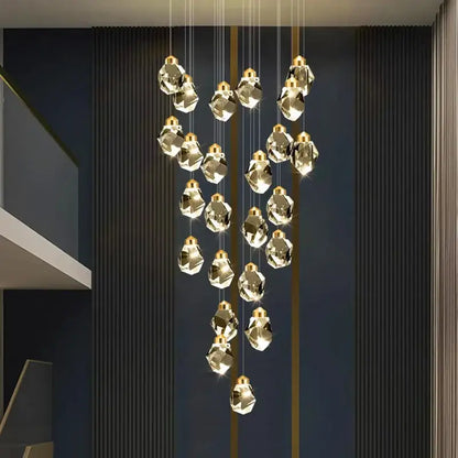 Decorbites crystal chandelier pendant light with gold-toned chains and faceted crystal pendants for modern interiors