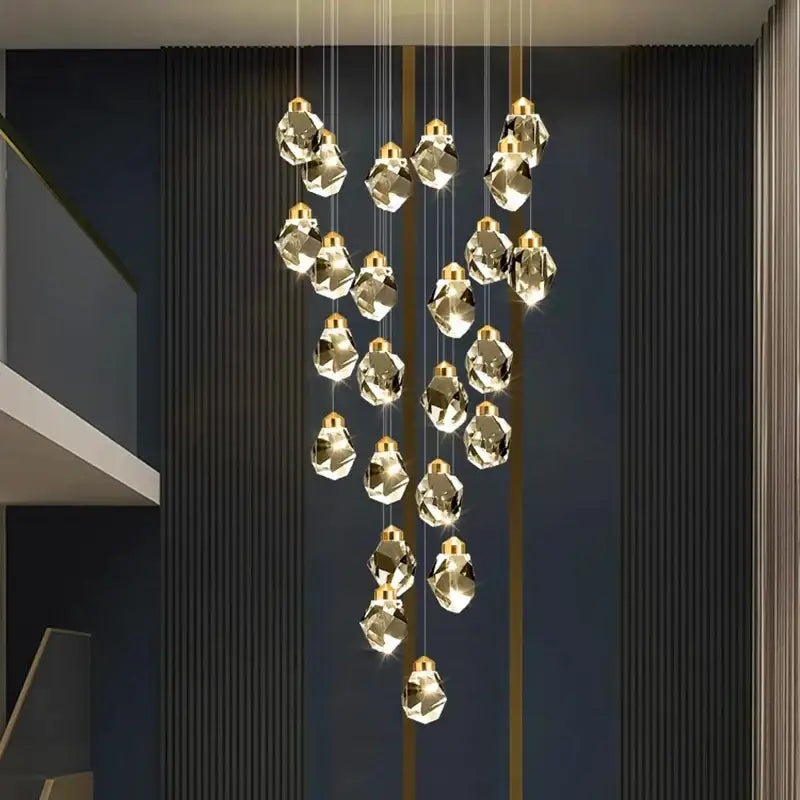 Decorbites crystal chandelier pendant light with gold-toned chains and faceted crystal pendants for modern interiors