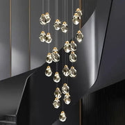 Modern decorbites crystal chandelier pendant light with faceted crystal pendants and gold-toned fixtures for living room