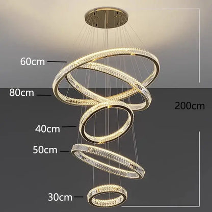 Modern decorbites crystal chandelier stair pendant featuring interlocking rings with clear crystals and warm led lights