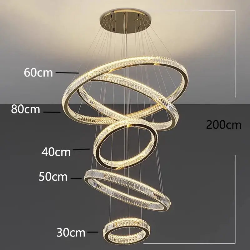Modern decorbites crystal chandelier stair pendant featuring interlocking rings with clear crystals and warm led lights