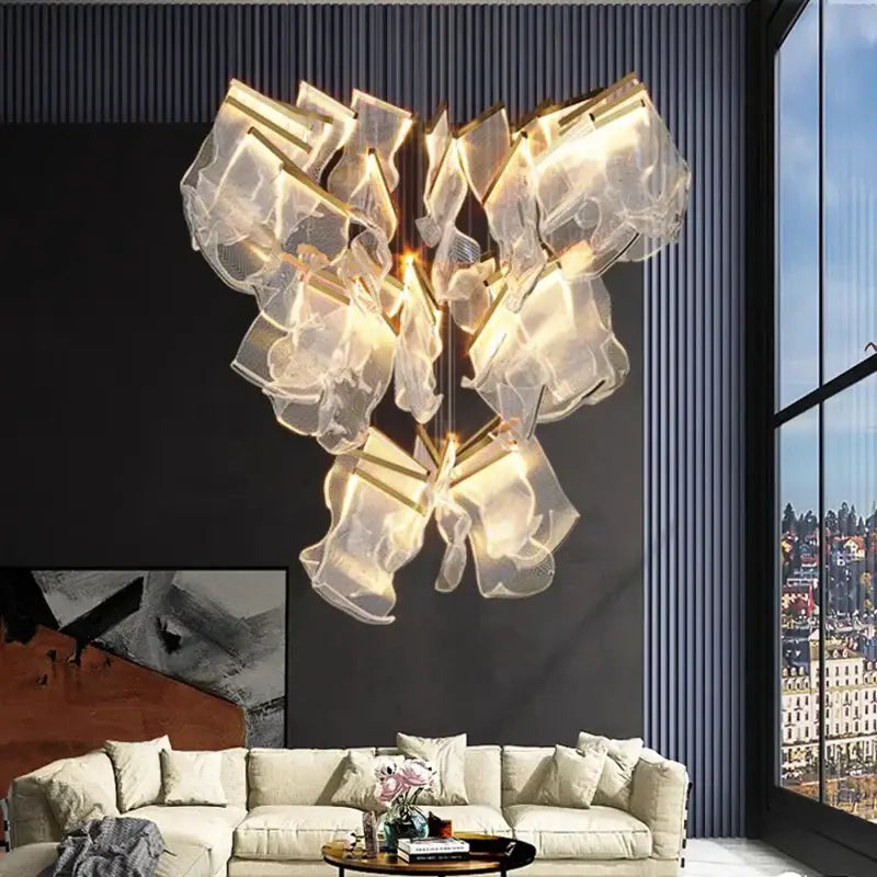 A modern DecorBites crystal chandelier stair pendant light with translucent glass and warm golden lighting
