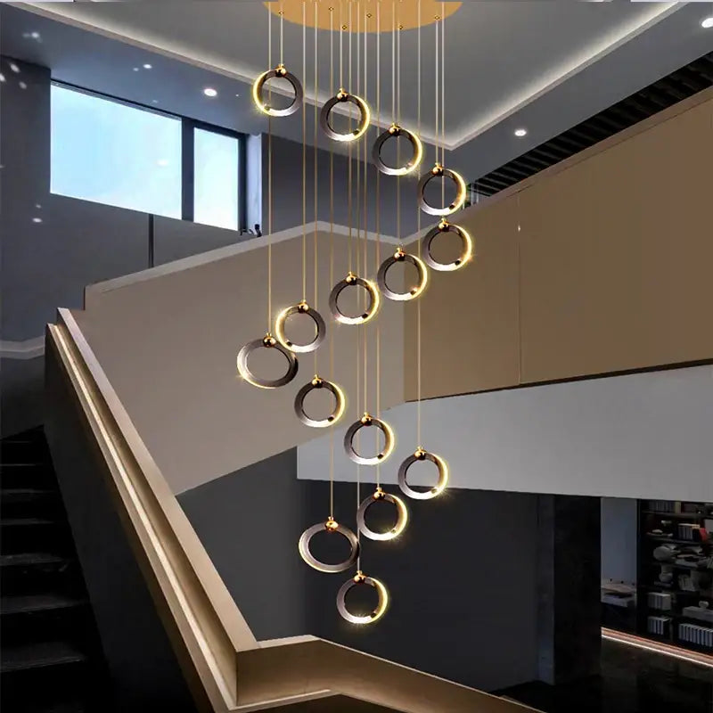 Modern gold-toned circular pendant chandelier with sleek minimalist design by DecorBites crystal chandelier for living rooms