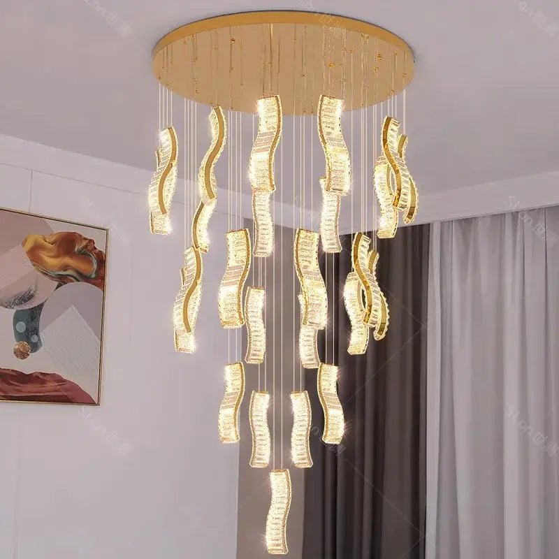 Golden circular DecorBites crystal chandelier pendant light with cascading wave-shaped crystal pendants for stairs