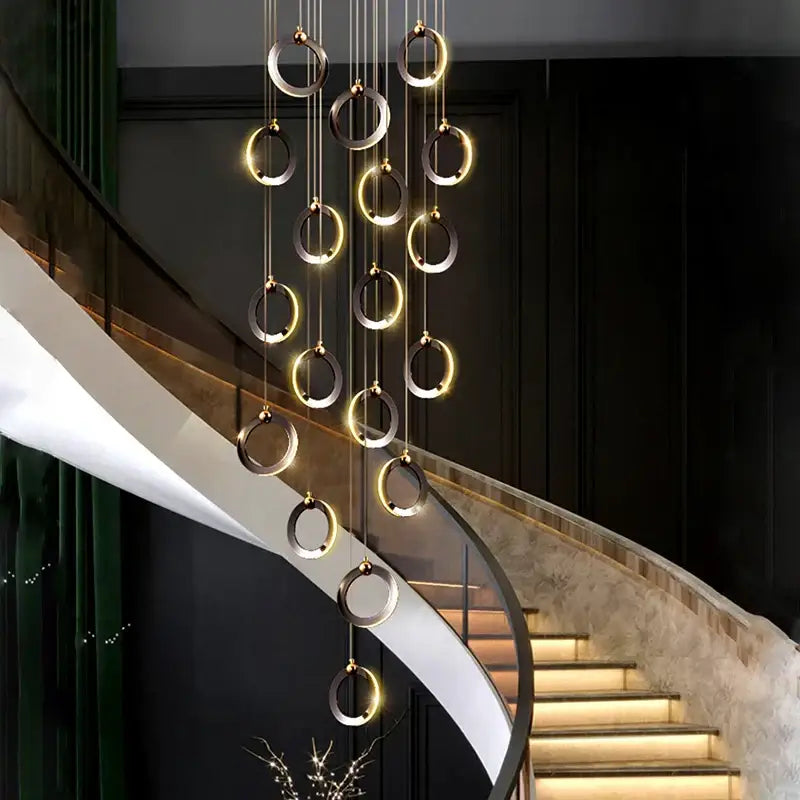 Modern hanging decorbites crystal chandelier with illuminated metallic rings in cascading design for interior decoration