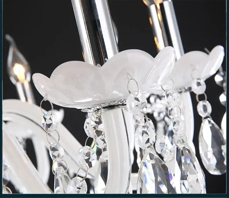 Decorbites crystal chandelier with 18 white arms led candle lights featuring polished chrome frame and clear teardrop crystals