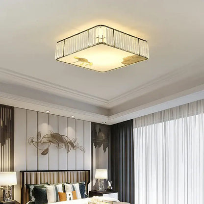 Rectangular decorbites crystal chinese ceiling light with clear crystal panels and gold lotus fish motifs for living room
