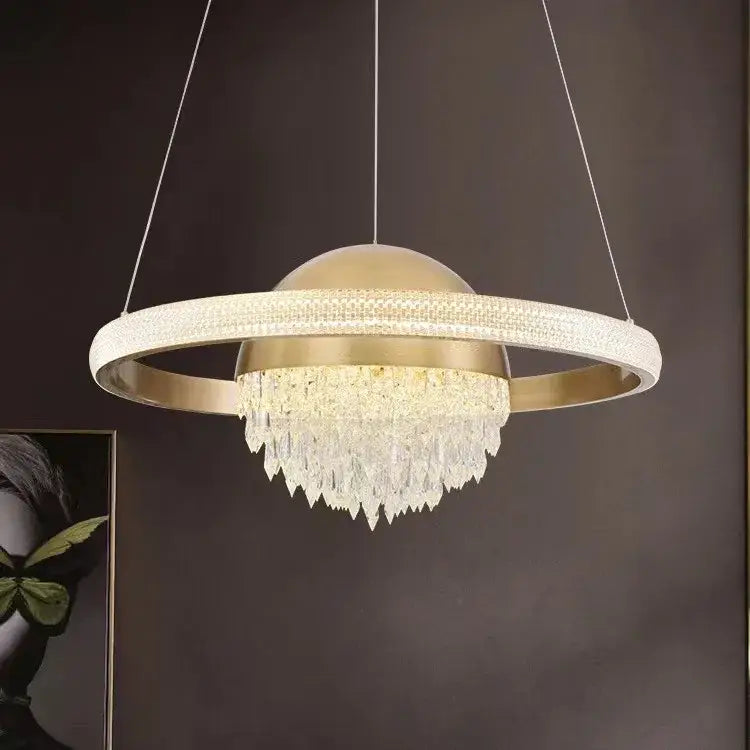 Gold-toned decorbites crystal copper pendant lights with central dome and cascading crystal fringe for luxury dining decor