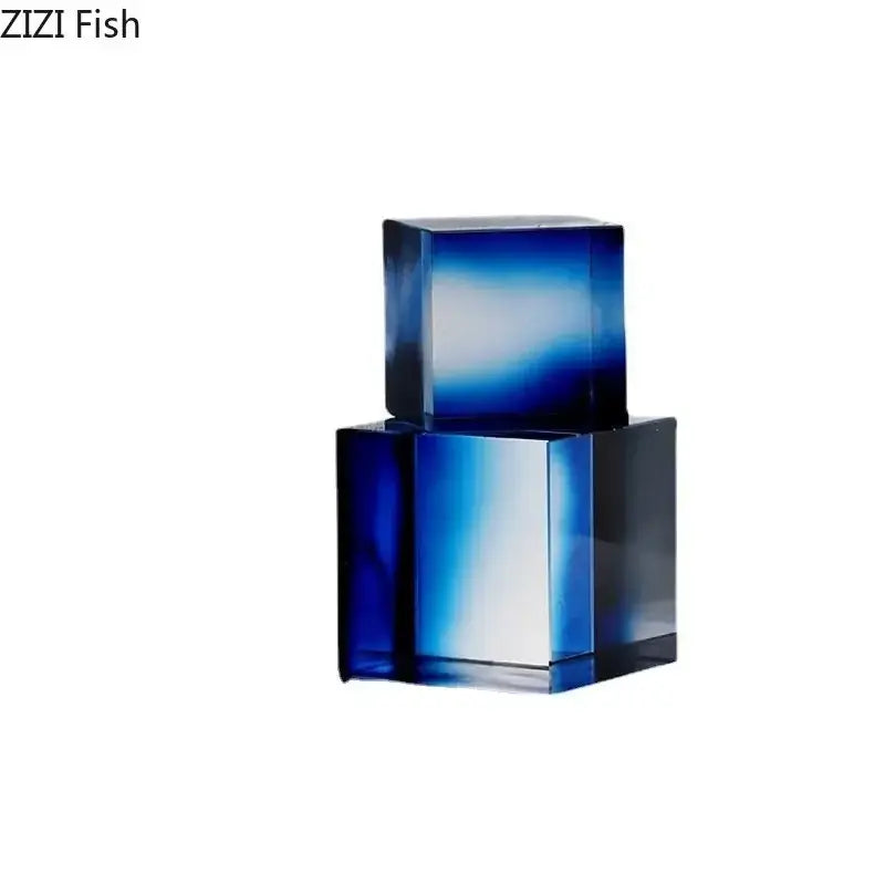 Stacked blue gradient glass cubes in a decorbites crystal cube golden translucent sculpture for living room decor