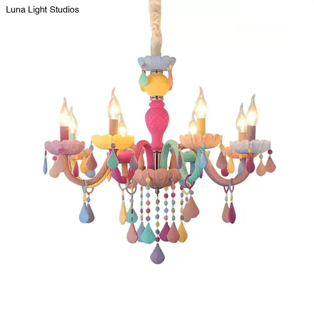 Pastel-colored DecorBites™ crystal decorated kids chandelier with pink column and multi-armed ceramic design for kindergarten
