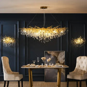 Golden branch-style decorbites crystal drop chandelier with dangling crystal droplets for dining room lighting