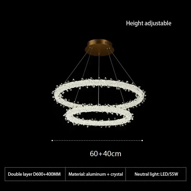 A modern decorbites crystal flower led chandelier with gold aluminum rings and clear crystal elements for dining room lighting