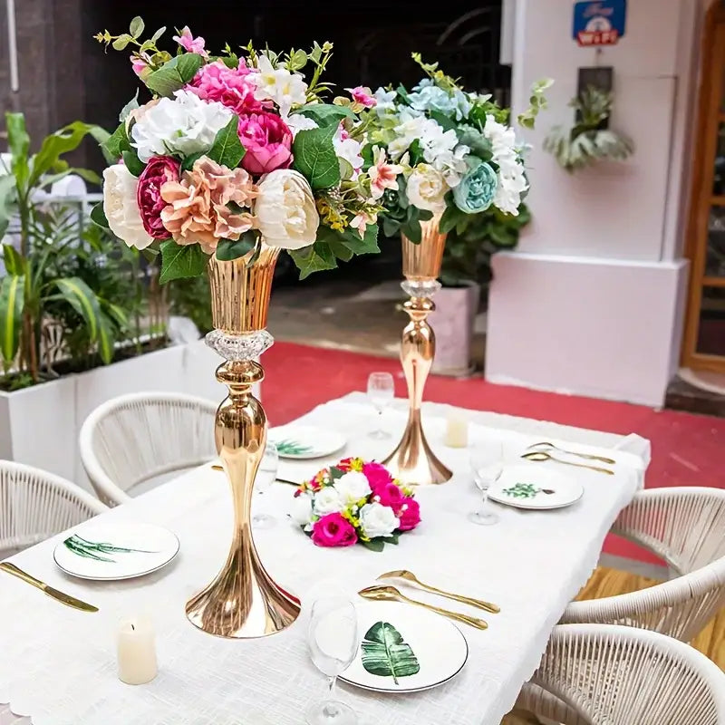Decorbites crystal flower stand set featuring gold-colored tall metal vases with ornate floral and crystal accents
