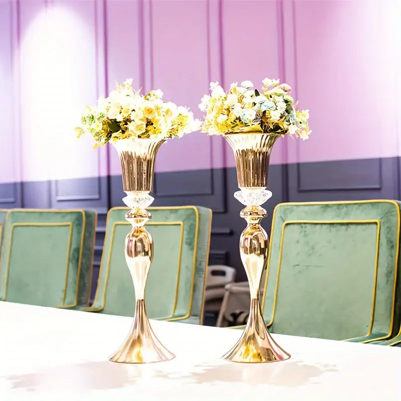 Two elegant gold-toned metal candle holders with crystal flower encrusted stems in the decorbites flower stand set