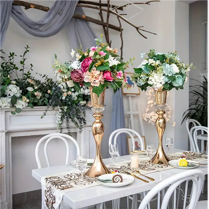 Decorbites crystal flower stand set features two 22 inch tall gold metal vases with fluted designs and floral arrangements