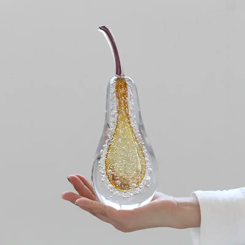 Decorbites crystal glass pear sculpture with golden amber core and maroon stem for living room decor