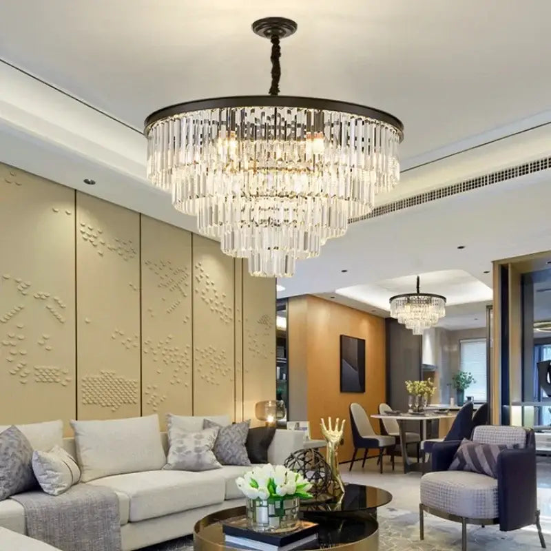 A decorbites crystal gold chandelier with dark metal frame and clear faceted crystals for living room lighting