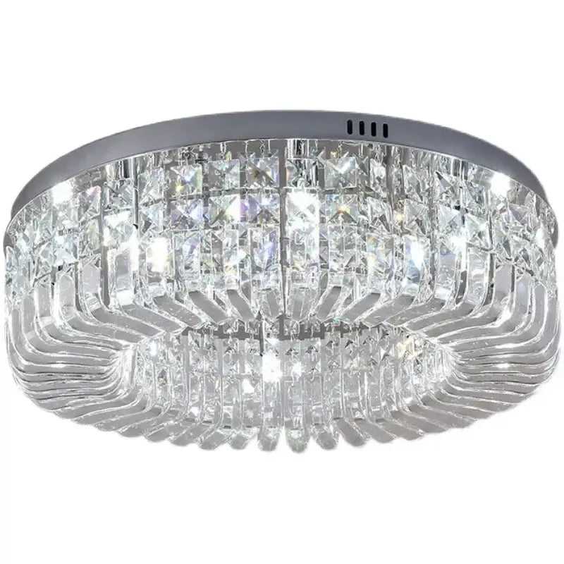 Circular ceiling light fixture with sleek chrome frame and clear crystal prisms from decorbites crystal gold ceiling collection