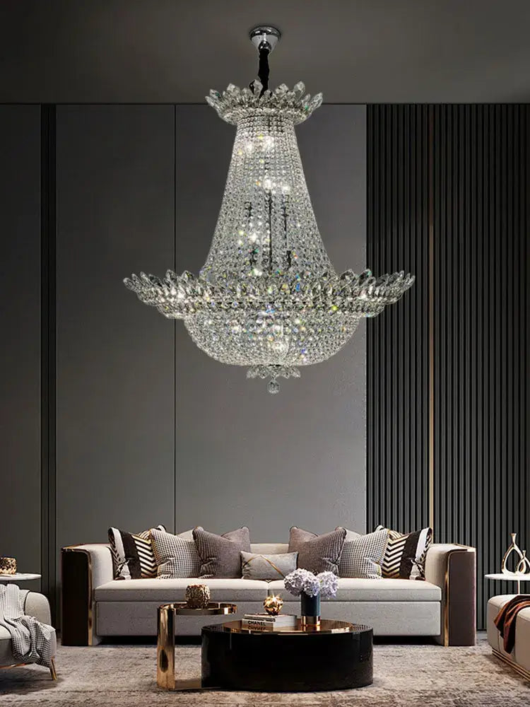 A decorbites crystal led chandelier with tiered fluted design and faceted crystals on a chrome fixture for living rooms