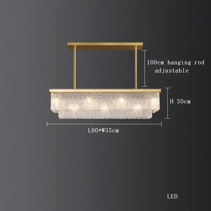 Gold-toned decorbites crystal led rectangular chandelier with cascading textured glass panels for dining room lighting