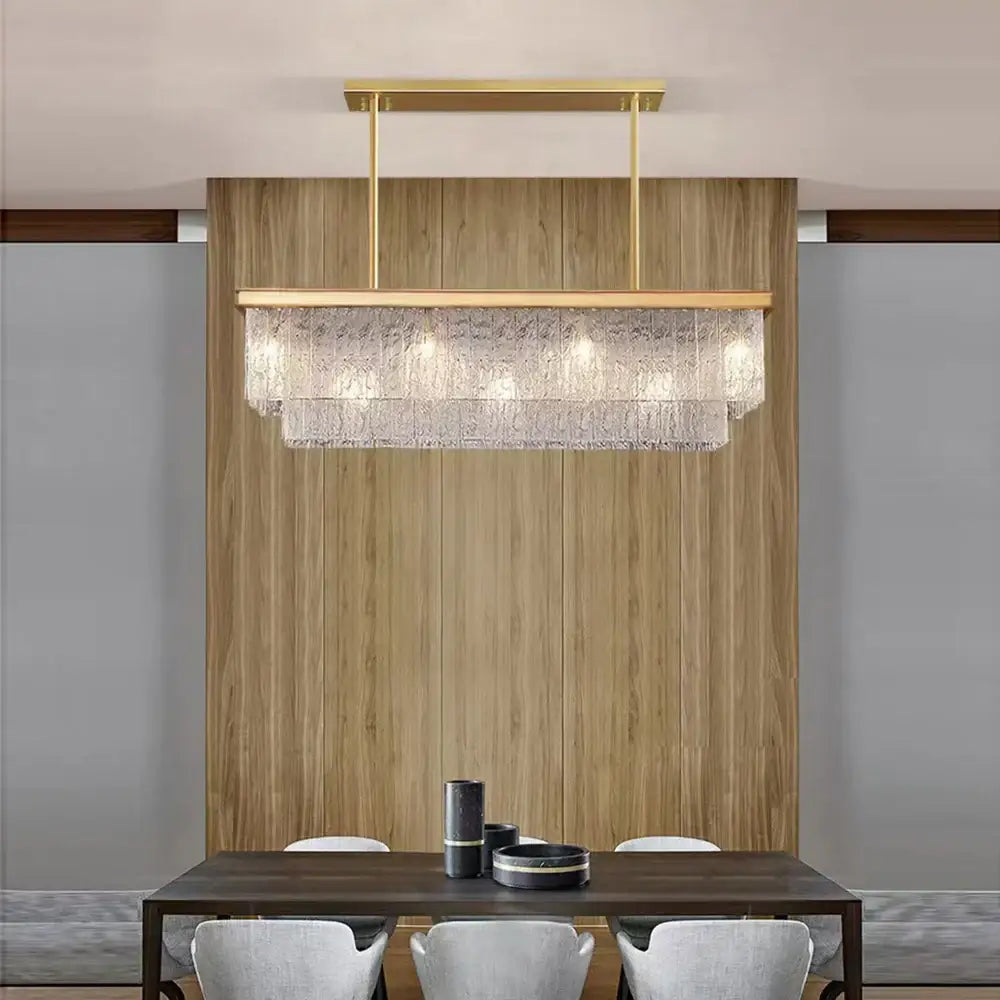 Gold-toned decorbites crystal led chandelier with layered textured glass panels for elegant dining room lighting