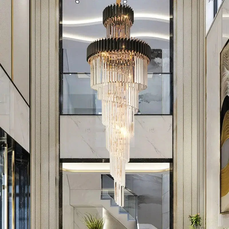 A decorbites crystal led multi-layer staircase chandelier with cascading crystal rods and black metallic accents