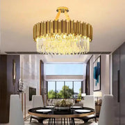 Decorbites crystal led gold chandelier with vertical brass bars and cascading crystal droplets for dining room