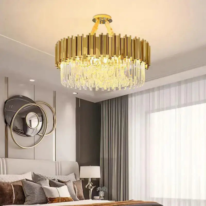 Gold-toned decorbites crystal led pendant chandelier with vertical bars and cascading crystal droplets for dining room