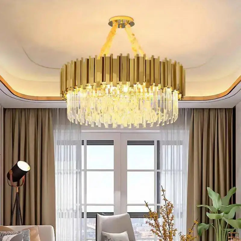 Gold-toned decorbites crystal led pendant chandelier with vertical bars and cascading crystal droplets for dining room