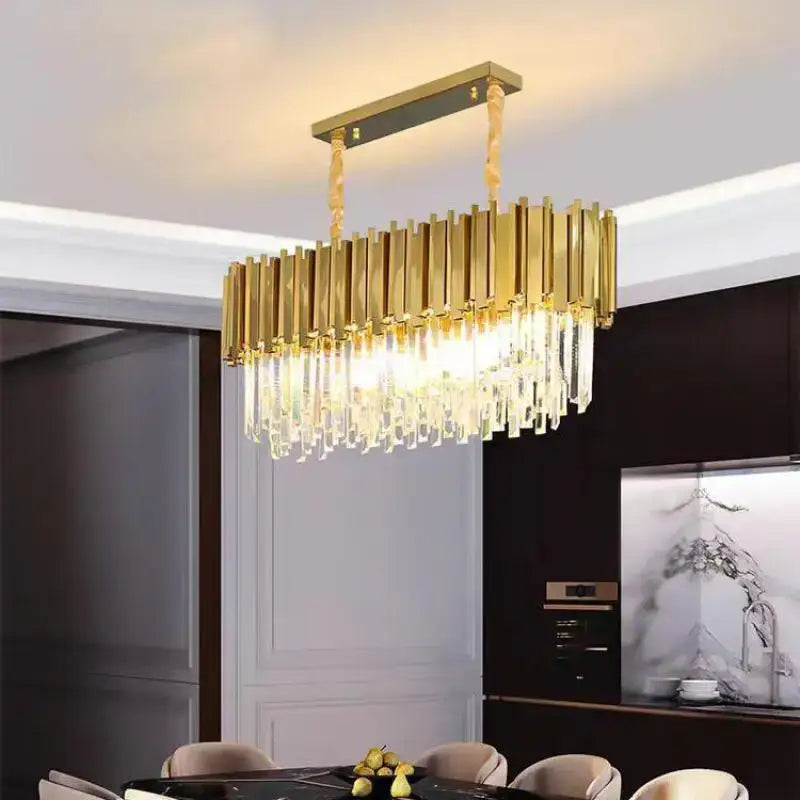 Gold-toned decorbites crystal led pendant chandelier with vertical bars and clear crystal prisms for dining room lighting