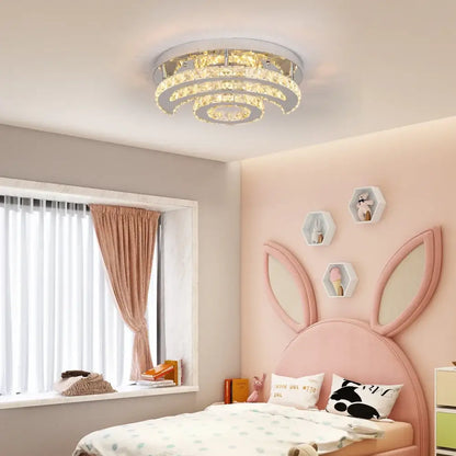 A decorbites crystal led sun moon spiral chandelier with clear crystal rings and polished chrome finish for dining rooms