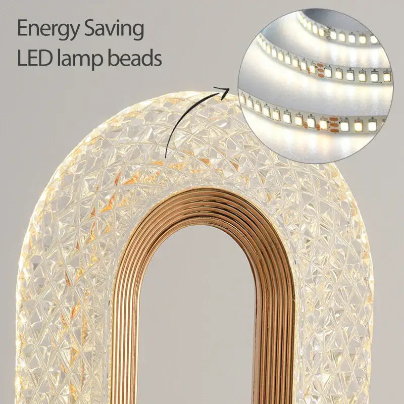 Clear faceted crystal led table lamp with gold metallic frame and energy-saving LED beads by Decorbites for bedroom use