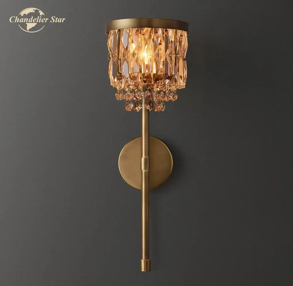 Brass-finished decorbites crystal led wall sconce with cascading crystal chandelier-style shade for dining room lighting