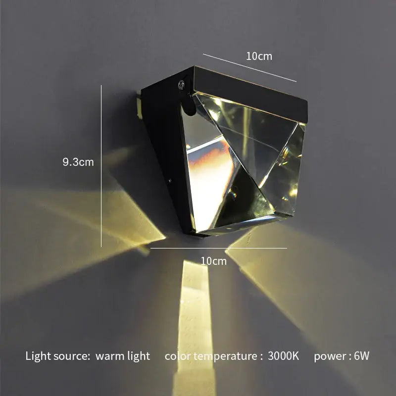 Modern gold crystal led wall sconce black geometric design with mirrored facets casting warm angular beams for decorbites crystal led wall decor