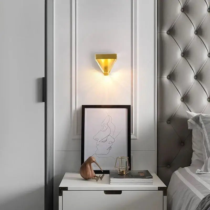 Modern gold crystal led wall sconce with triangular geometric design for bedroom decorbites crystal led wall lighting