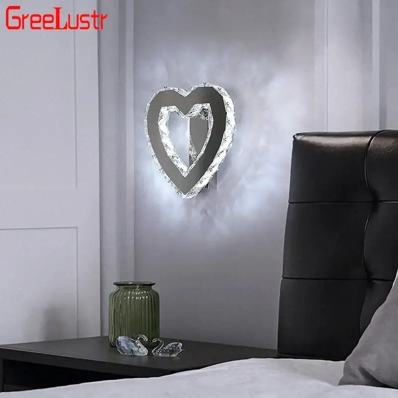 Silver heart-shaped crystal led wall sconce with sparkling crystal border and sleek metallic frame for bedroom decorbites wall sconce