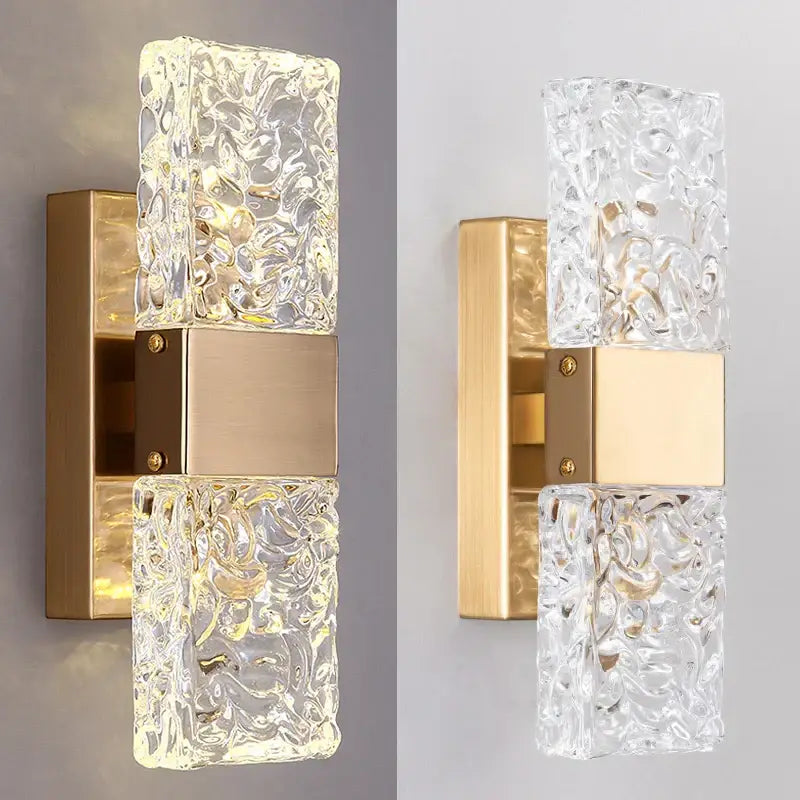 Clear textured glass led wall sconce with gold-toned metal bracket for modern bedroom wall sconces design