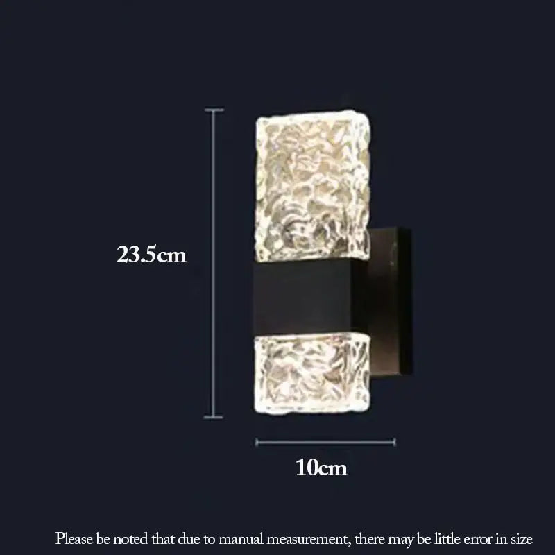 Modern textured glass led wall sconces in chrome black and gold with two illuminated translucent glass cubes for bedroom use