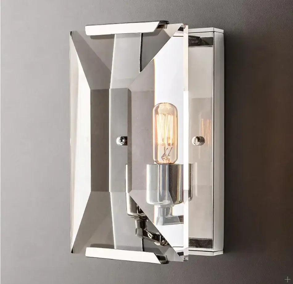 Modern chrome-finished wall sconce with geometric mirrored panels and visible edison bulb decorbites crystal led wall