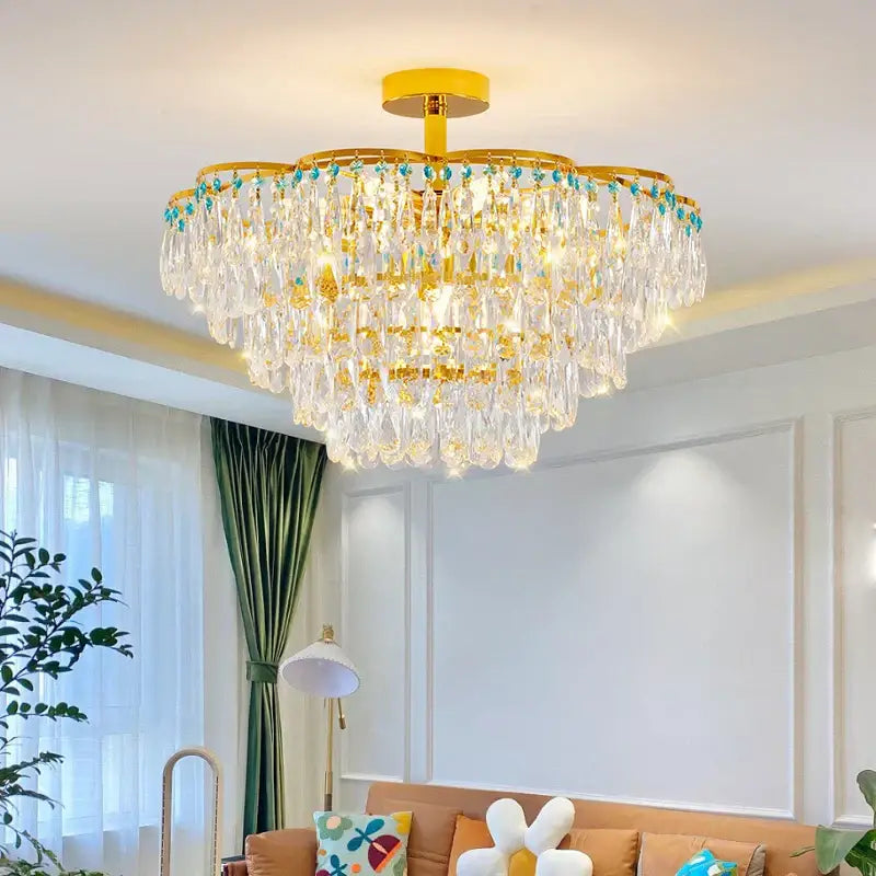Luxury gold and turquoise decorbites crystal light chandelier with multi-tiered crystal and teardrop accents for dining room decor