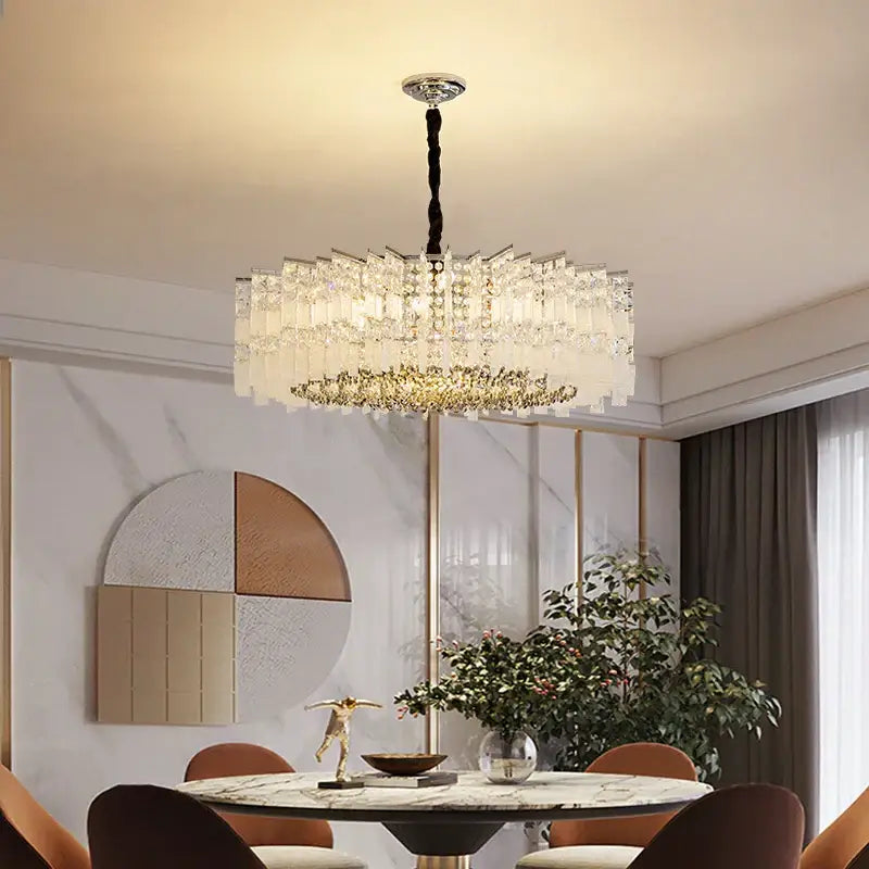 Modern rectangular chrome crystal light chandelier with tiered clear and gold-toned crystals by decorbites crystal light
