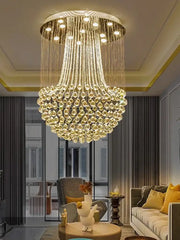 A modern luxury gold crystal light chandelier with cascading teardrop strands for elegant dining room decorbites crystal light